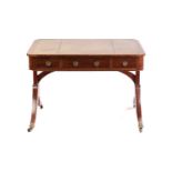 An unusual George IV ebony strung library table with crossbanded and tooled leather inset top with