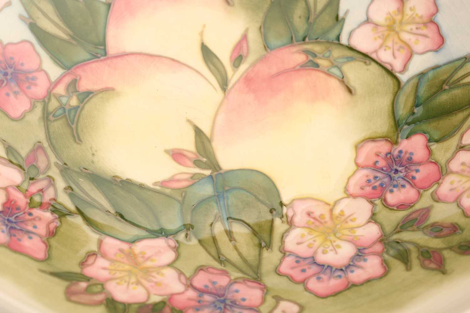 A limited edition Moorcroft fruit bowl, late 20th century, decorated with apples, flowers and leaves - Image 4 of 5