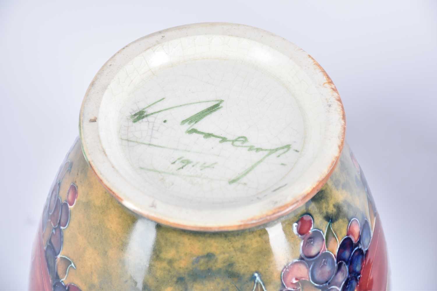 An early 20th Century William Moorcroft Pomegranette vase on an ochre background, base signed W - Image 9 of 11