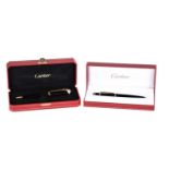 A Diabolo de Cartier ballpoint pen, with blue cabochon, serial number 250610, in presentation case