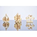 Three Japanese ivory netsukes, Meiji period, comprising the seven gods of good fortune upon an