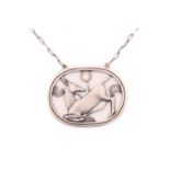 Georg Jensen - a necklace with kneeling deer and flowers, attached to a cable chain and toggle