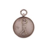 A 1920s circular silver golfing medal Birmingham 1925, bearing decorated with an Edwardian golfer in