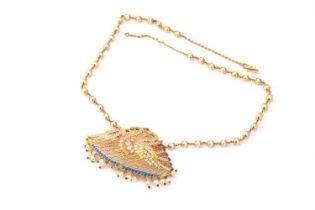 An Indian polychromatic stone set necklace, depicting a pair of swans on a fan-shaped pendant,