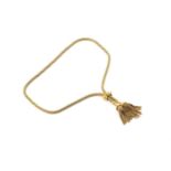 A lariat necklace in yellow precious metal, comprises a tubular mesh chain with tassel terminations,