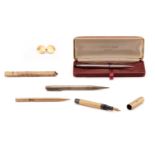 Four pens, a pair of scissors and a single cufflink; to include a 9ct gold Mordan Everpoint