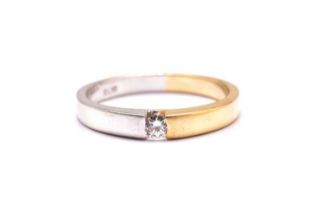 A tension-set diamond ring, featuring a single brilliant diamond with an estimated weight of 0.08ct,