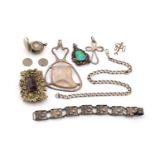 A mixed lot with an amethyst set buckle and other silver items; The buckle is set with a sugarloaf