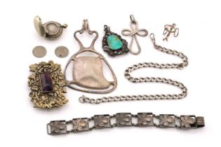 A mixed lot with an amethyst set buckle and other silver items; The buckle is set with a sugarloaf