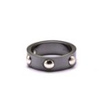 A Louis Vuitton Emprise ceramic ring with diamond, comprises of a black ceramic band, with round