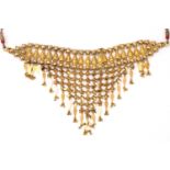 An Indian tribal bib necklace in yellow precious metal, mesh chain mail with faceted details and