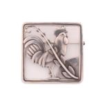 Georg Jensen - A cockerel brooch, depicting a cockerel with fern accent in a square frame, with