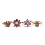 A mixed collection of four flowerhead rings, to include a pink stone with split pearls ring in