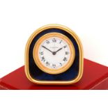 A Les Must De Cartier Travel clock and matching Cartier picture frame, with a manual wind movement