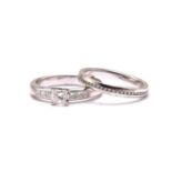 A diamond engagement ring and an eternity ring in 18ct gold, the engagement ring features a princess