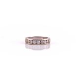 A diamond half eternity ring, consisting of nine graduated brilliant diamonds, with an estimated