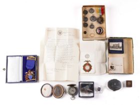 A mixed lot of medals, a House of Lords vanity mirror, another, a compass, a yellow metal cut