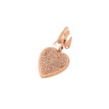 A heart-shaped pendant with diamonds, comprises a hollow heart pendant in yellow precious metal,