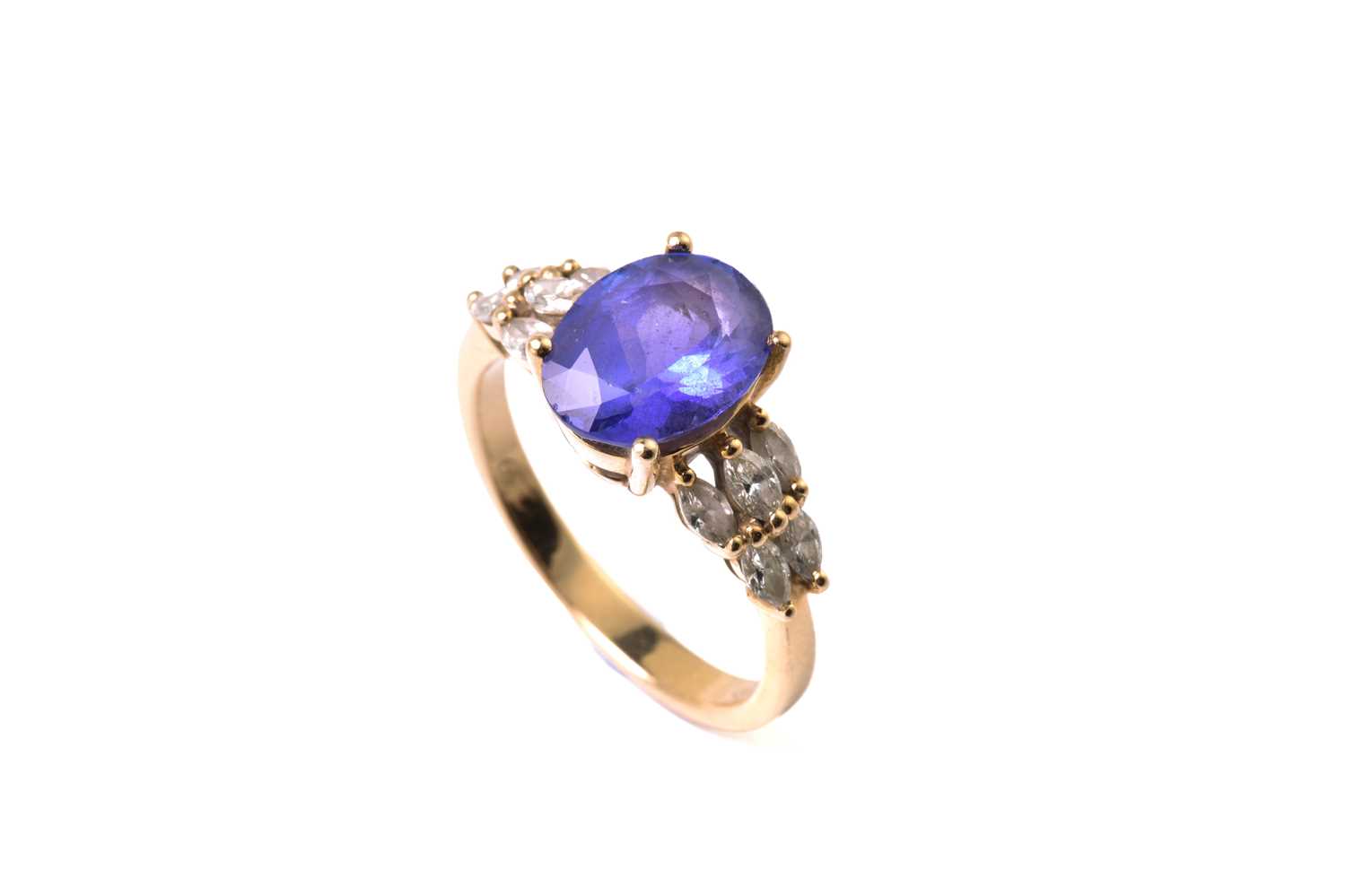 A tanzanite and diamond dress ring, featuring an oval tanzanite approximately measuring 9.8 x 7.5 - Image 2 of 6