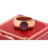 An amethyst dress ring, comprises a round rose cut amethyst, approximately measuring 9.7 mm