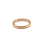 A 22ct gold plain wedding ring, with court shaped band, Birmingham hallmarked with sponsor's mark '