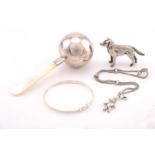 A small collection of silver items, to include an expandable bangle, a teddy bear bracelet, a baby's