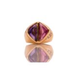 A two-tone dress ring with amethyst and rubellite, consisting of a fancy-cut amethyst and a