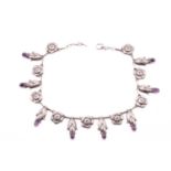 Georg Jensen - An amethyst fringe necklace, with rosette flowerheads alternating with stylised