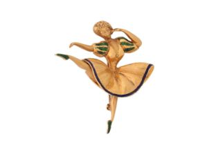 An enamel ballerina brooch, featuring a figurine of a dancing ballerina in a textured dress with