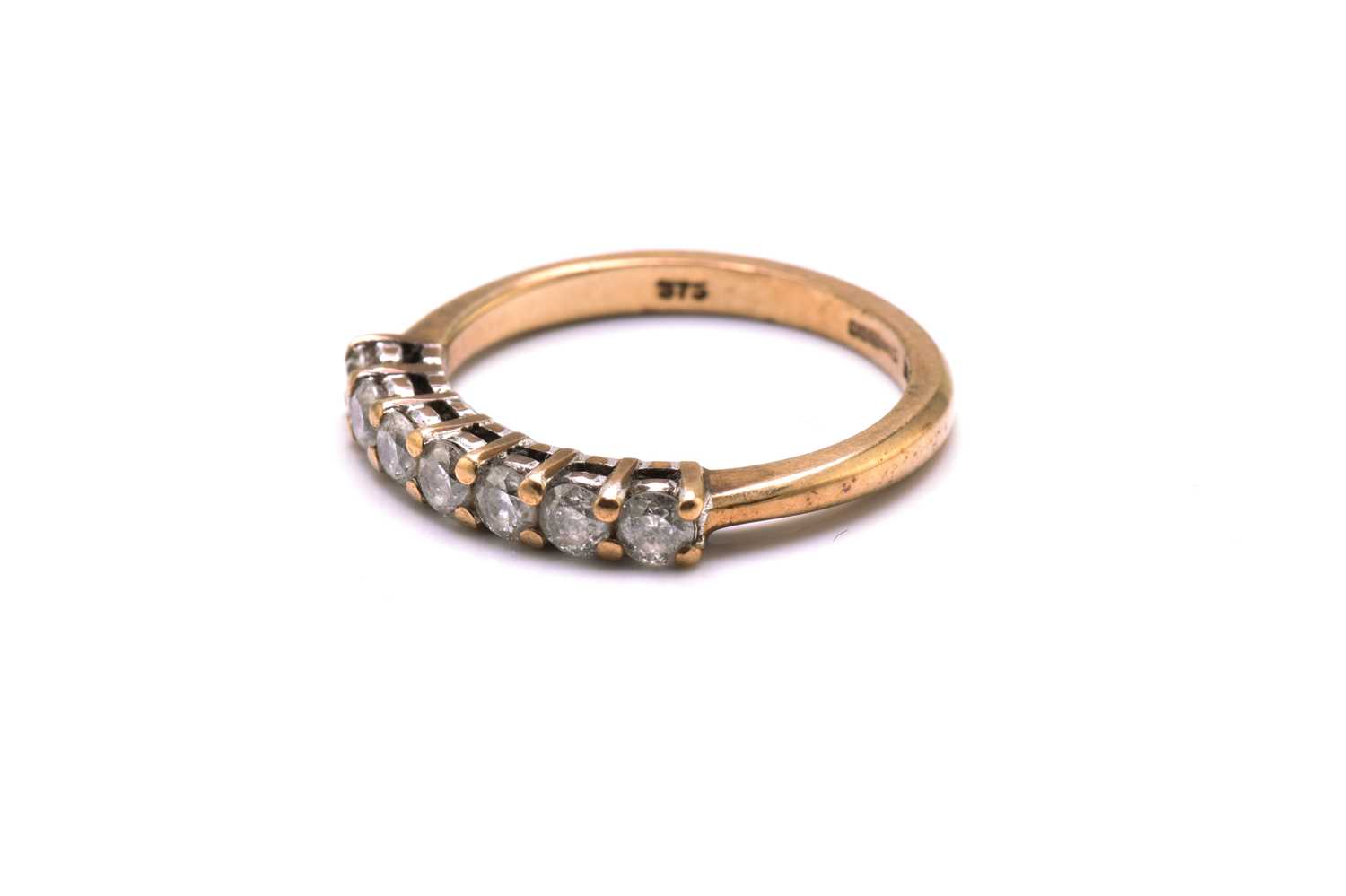 A 9ct gold seven-stone diamond ring, consisting of seven brilliant diamonds with an estimated - Image 4 of 4