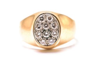 A signet ring pavé set with diamonds, comprises ten brilliant diamonds with an estimated total