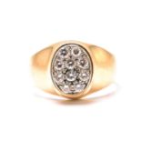 A signet ring pavé set with diamonds, comprises ten brilliant diamonds with an estimated total