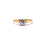 An 18ct gold solitaire diamond ring, comprises a brilliant diamond with an estimated weight of 0.