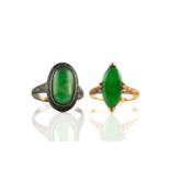 Two jade rings, one comprises a marquise-shaped chrome green jadeite cabochon claw set on a yellow