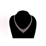 Tiffany & Co. - A silver mesh bib necklace with tie ends, designed by Elsa Peretti, signed by T&