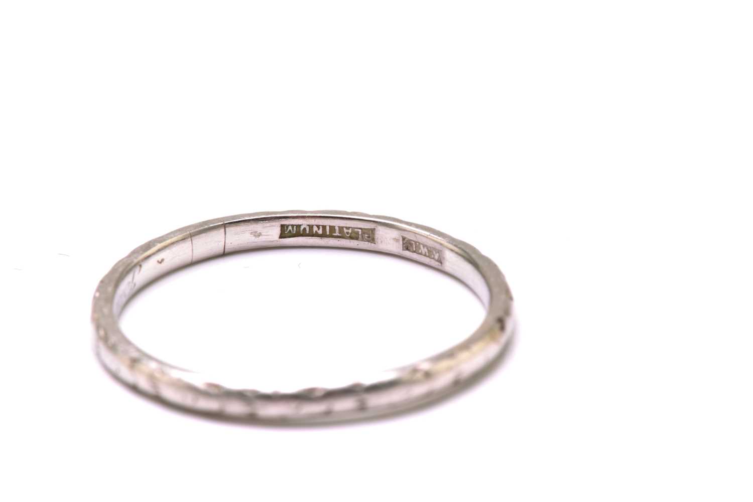 An 18ct gold ring and a platinum ring, the gold ring has a plain court band, stamped 'FIDELITY' - Image 5 of 5
