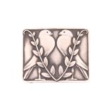 Georg Jensen - a silver belt buckle, depicting a pair of doves and olive branches, designed by