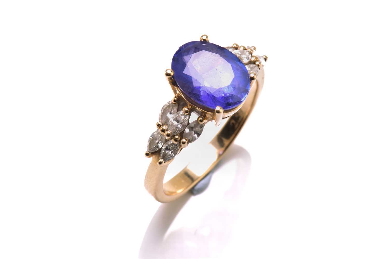 A tanzanite and diamond dress ring, featuring an oval tanzanite approximately measuring 9.8 x 7.5 - Image 6 of 6