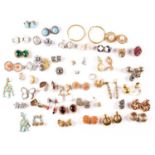 A large collection of costume jewellery clip-on earrings including examples by Kenneth Jay Lane,