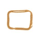 A Garrard 18ct gold necklace, comprises a wheat chain secured with lobster clasp, with London import