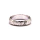 A platinum engraved wedding band, with floral patterns and millgrain details, Birmingham