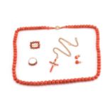 A precious coral graduated bead necklace and a quantity of other coral jewellery; including An early