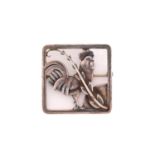 Georg Jensen - A cockerel brooch, depicting a cockerel with fern accent in a square frame, with