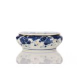 A Chinese porcelain seal wax pot and cover, of circular form, the cover painted with a butterfly