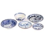 A collection of Chinese blue & white porcelain, Qing, 17th - 19th century, comprising a small saucer