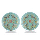 A pair of Chinese magpie & prunus dishes, painted with a central double Shou surrounded by four
