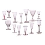 A collection of thirteen 18th and 19th-century drinking glasses, to include examples with opaque