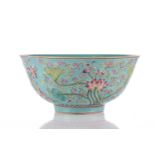 A Chinese Famille rose lotus bowl, the exterior painted with lotus tendrils issuing leaves and