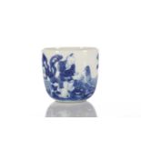 A Chinese blue & white chicken cup, Qing, painted with a boy and chicken between rocks and