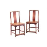 A pair of Chinese walnut (Hetaomu) "Yoke" backed side chairs, Qing Dynasty probably mid 19th